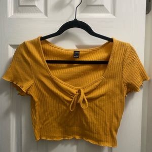 Yellow crop top